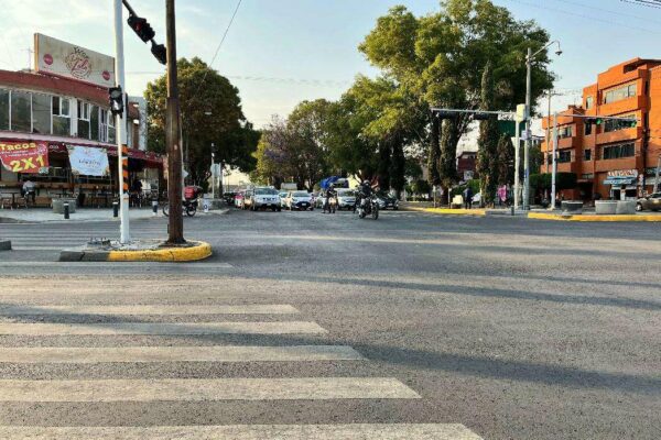 view of cars and crosswalk