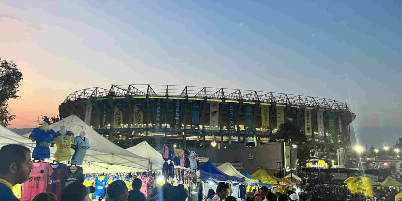 Azteca Stadium at the distance day game sunset.