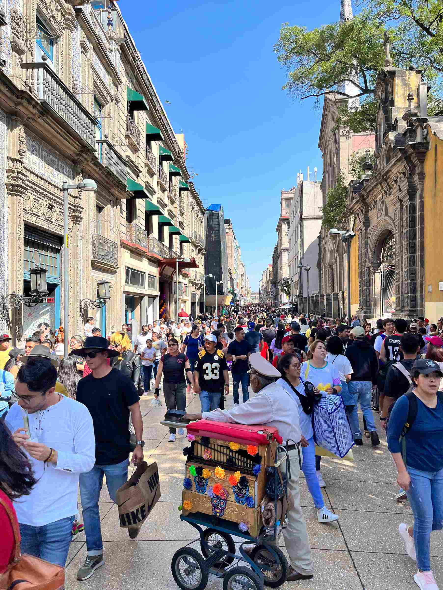 Madero Street busy, facing Zocalo.