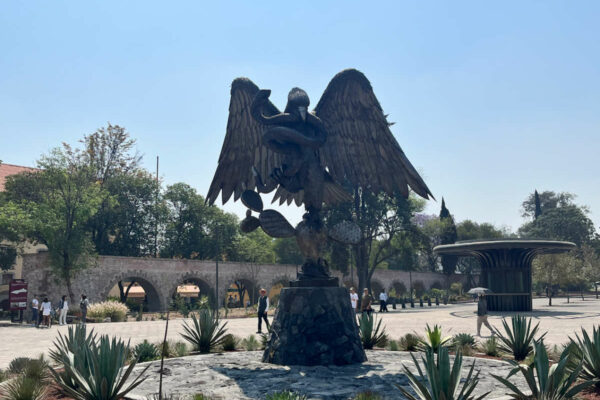 Eagle eating a snake at Los Pinos in Mexico City.