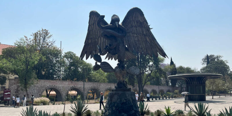 Eagle eating a snake at Los Pinos in Mexico City.